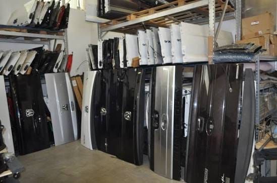 Tailgates stored indoors on the rack